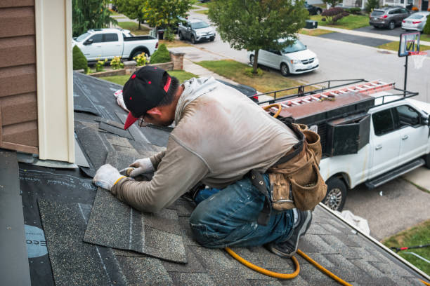 Professional Gutter Repair And Installation technician working in Keene, OH